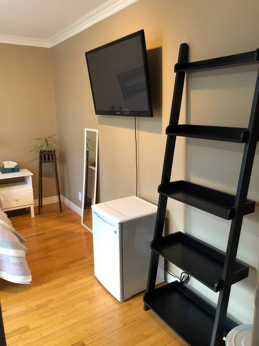 43" TV on adjustable wall mount with Apple TV