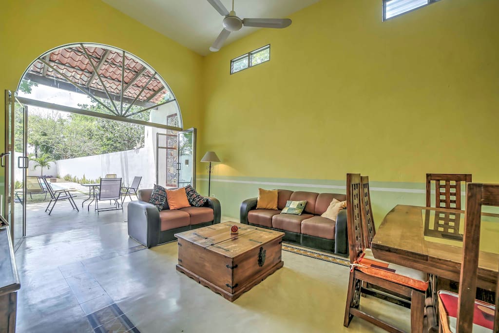 Admire views of the private pool from the inviting, open interior.