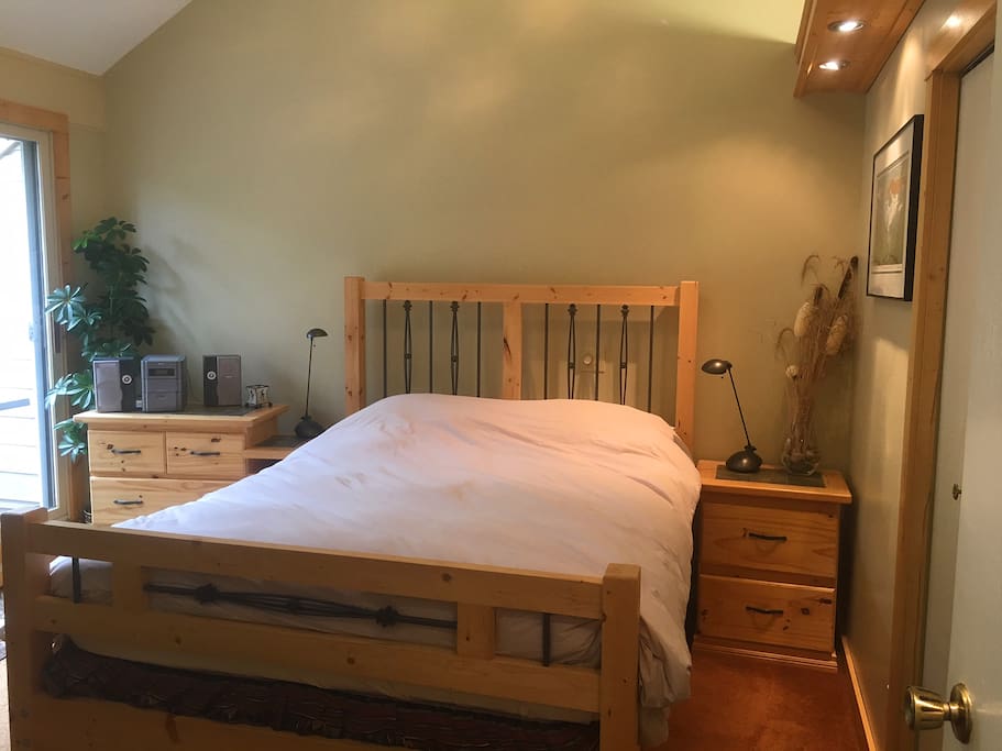 Master Bedroom with queen bed and private deck