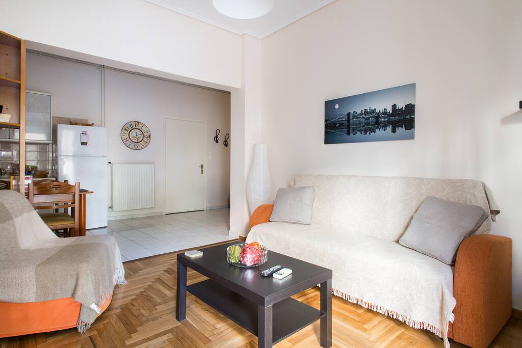 The living room with a double pull out sofa,a single pull out sofa and a/c
