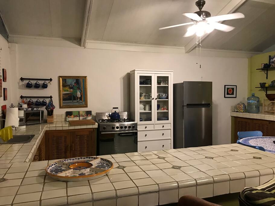 Bright spacious kitchen with full-size appliances & island seating
