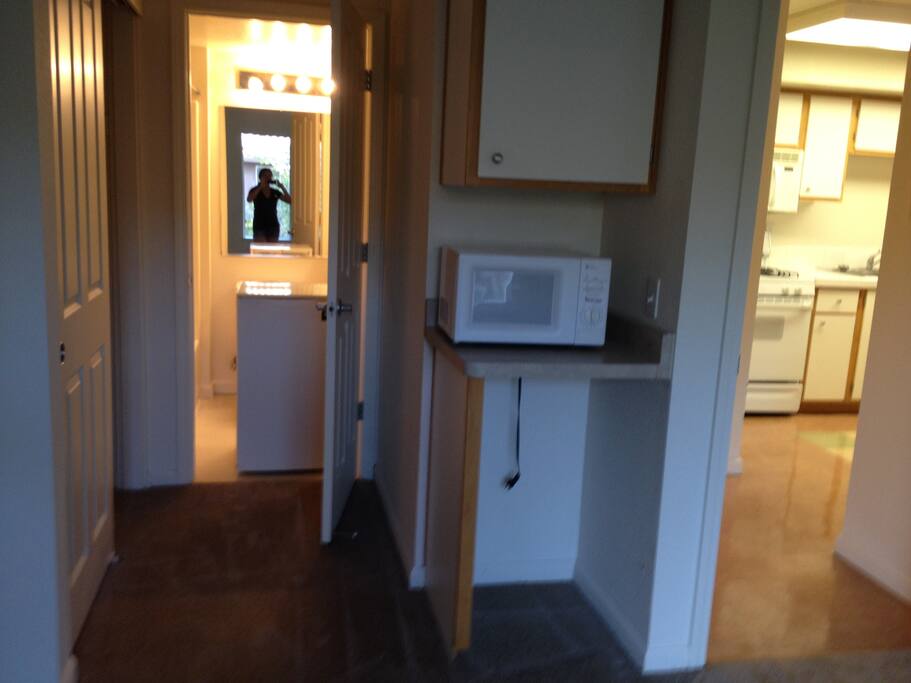 Room has adjoining bathroom, mini fridge, and microwave. Also closet and cabinet space!