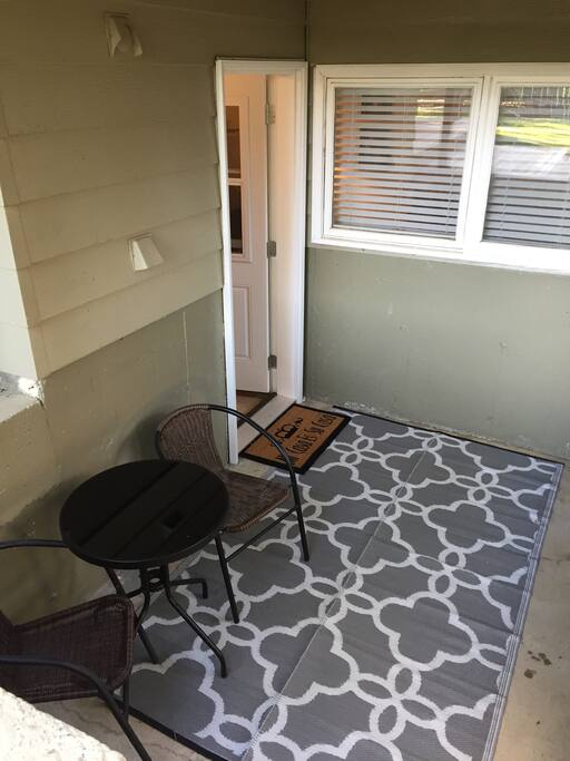 Private entrance with outdoor seating