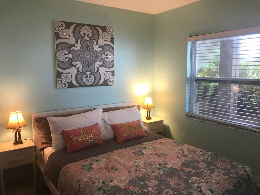 Queen size mattress foam bed with water views, cedar closet and two nightstands.