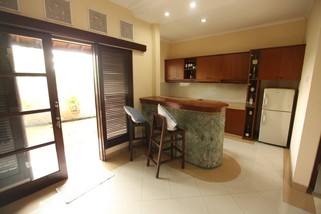 the house equipped with the kitchen pantry and fridge and facing to the beautiful garden and ricefield