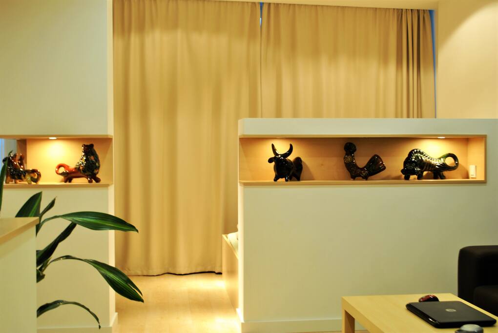 The authentic Ukrainian ceramics add a nice touch to the apartment design
