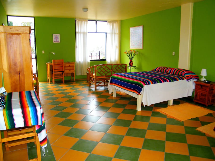 View of room showing desk and chair.