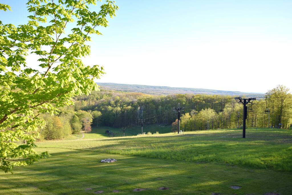 view of ski slopes from deck