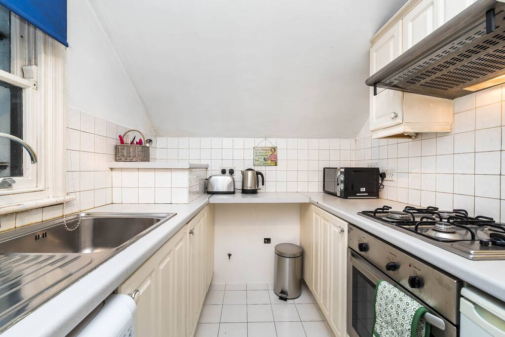 Kitchen has everything you need to cook a meal.