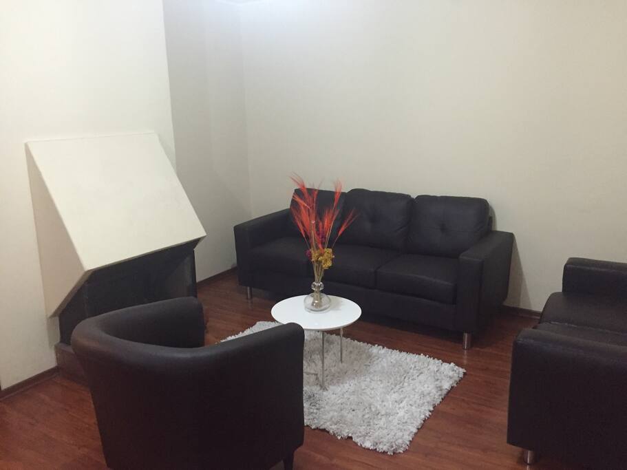 Sala de estar con chimenea