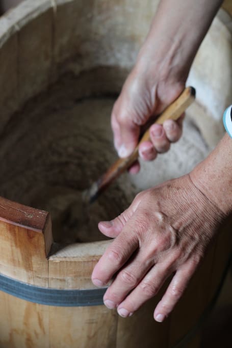 Mother is making bread