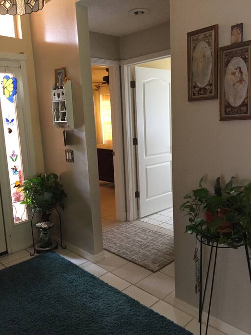 Foyer with view of private bath & bedroom, guest will have added privacy if they choose with a hanging curtain at this entrance.