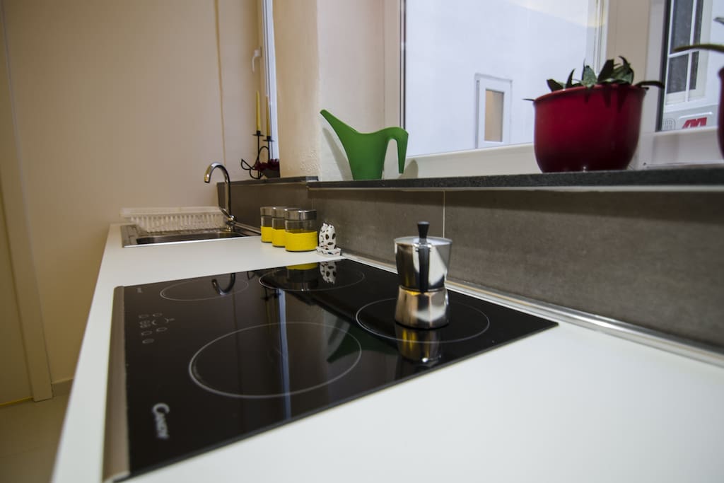 The kitchen is fully-equipped with dishwasher, fridge freezer, sink, cooker and hob