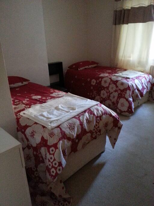 Separate single beds in bedroom 1