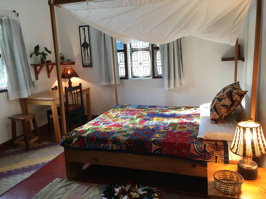 Enjoy your sunny self-contained bedroom with a desk, ceiling fan, private bathroom, and large built-in locking cupboards.
