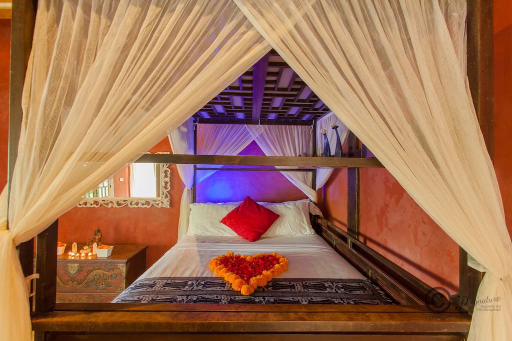 Large, four poster bed