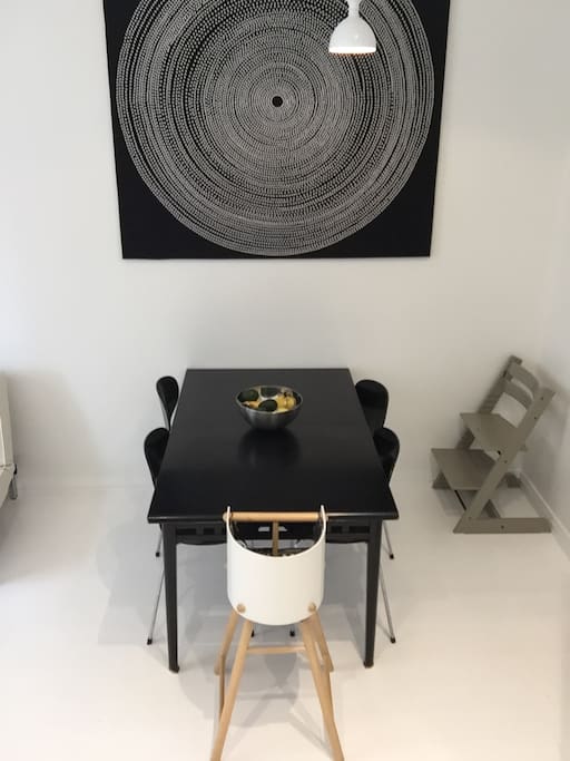 There is a dining table that can fit 4 adults and 2 children. Additional chairs available on request.