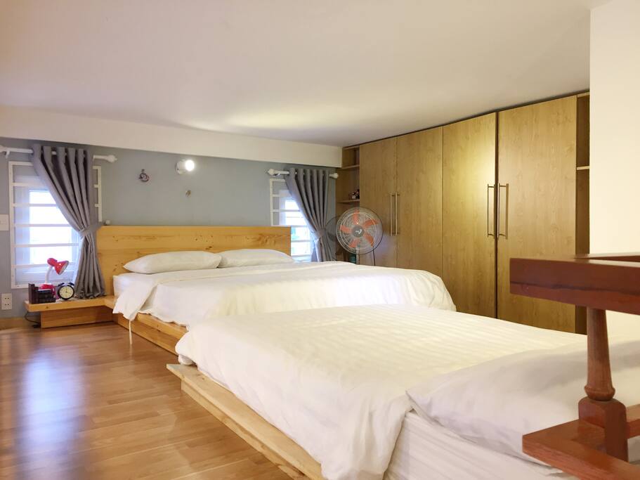 Comfortable beds on mezzanine.