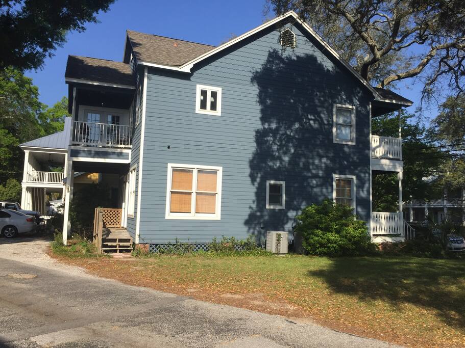 Side of building with 2nd floor balcony off great room