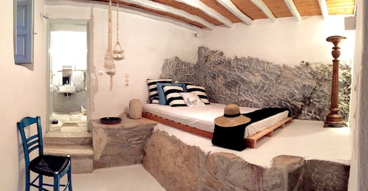 lower floor bedroom, rock-carved bed