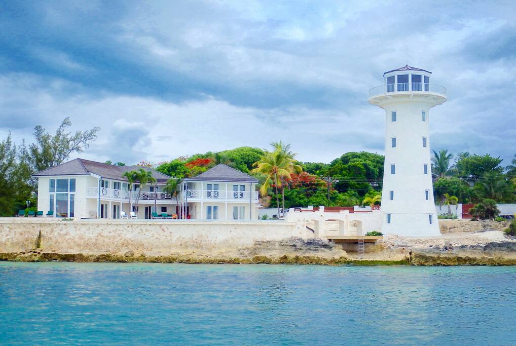 The house and lighthouse viewed from the sea