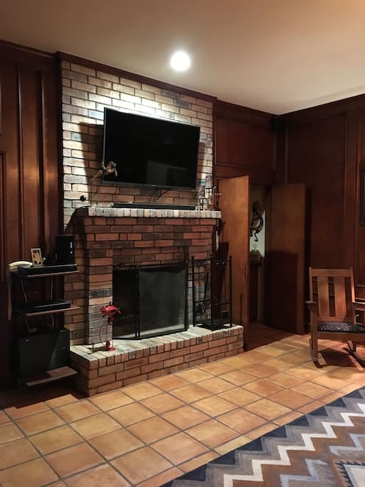 Den with Fireplace and Large Screen TV