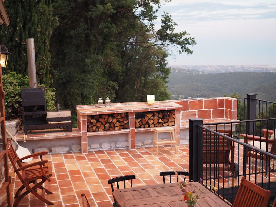 New extended balcony with outdoor kitchen and BBQ/oven/fireplace