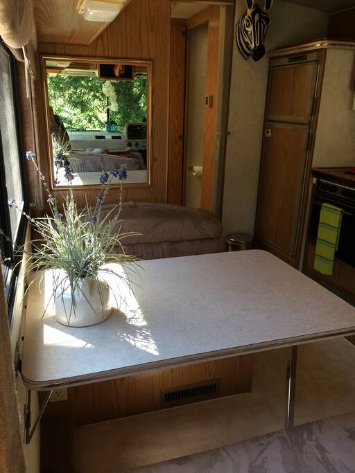 Table folds into a bed, which is comfortable for a child or adult of regular height.