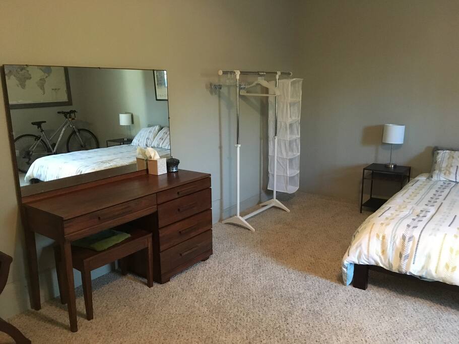 Dressing area with large vanity and clothing rack!