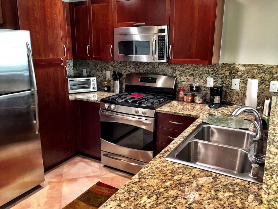 Kitchen with Blender, Toaster Oven, Coffee Pot, Dishes and Everything You Need to Cook a Meal