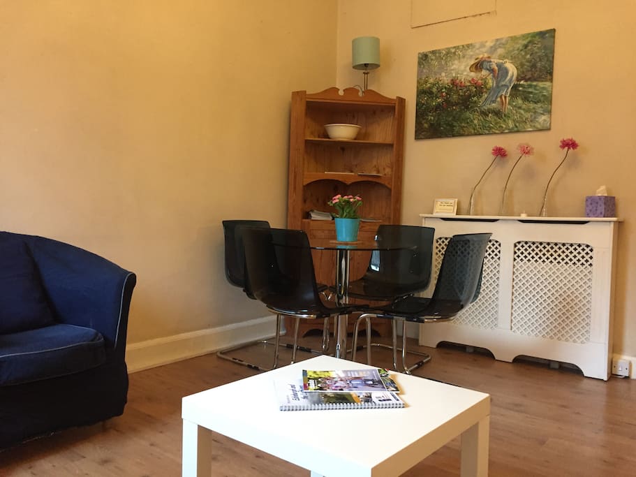 Light and airy living room with sofa bed, Internet computer (Free WIFI), tv and dining table