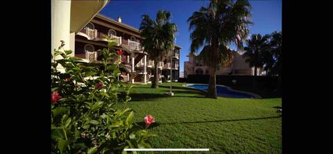 Low with direct access pool and garden.