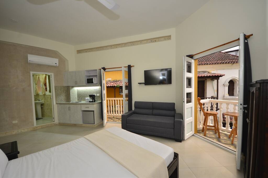 Balcony doors with bathroom door on left