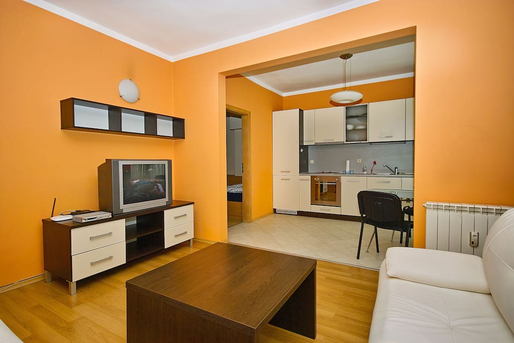 Living room with open plan kitchen