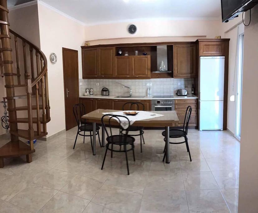 The kitchen is fully equipped with all the appliances if you want to cook.