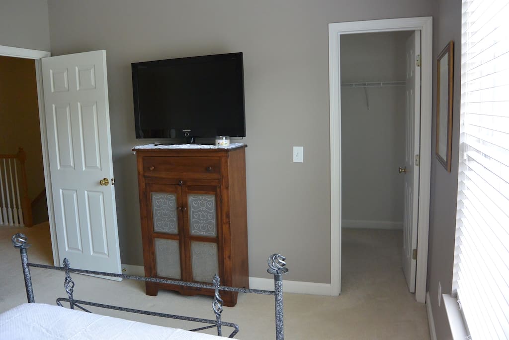 TV with local channels and large walk-in closet