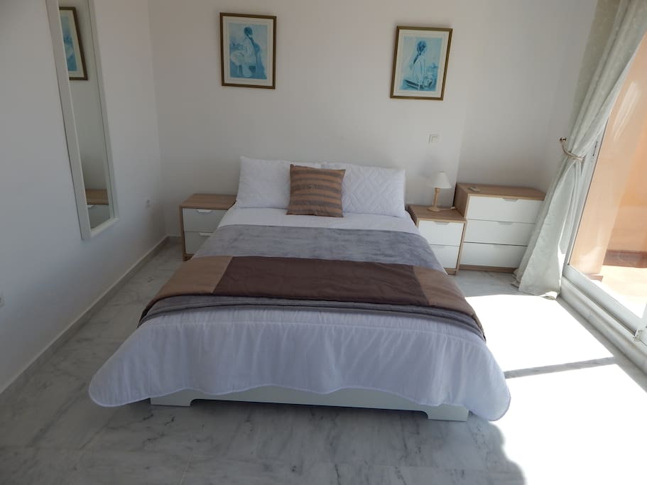 Sunny dual aspect terraced master bedroom
