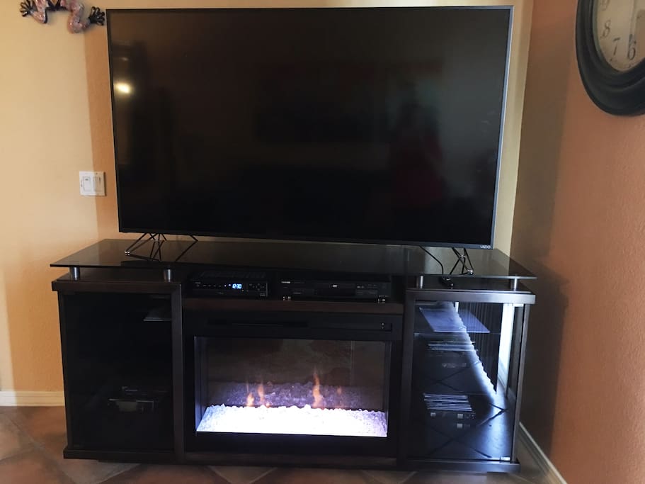 70" TV with fireplace