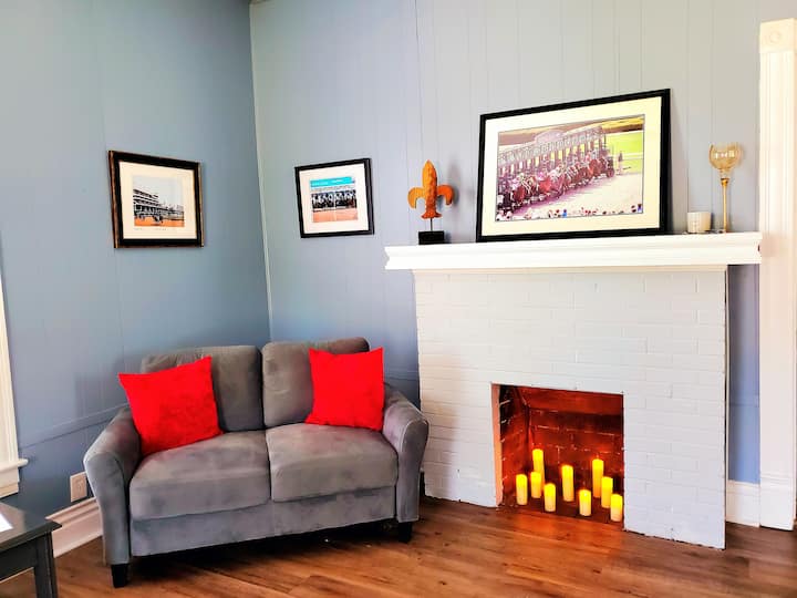 Beautiful faux fireplace gives cozy vibes.