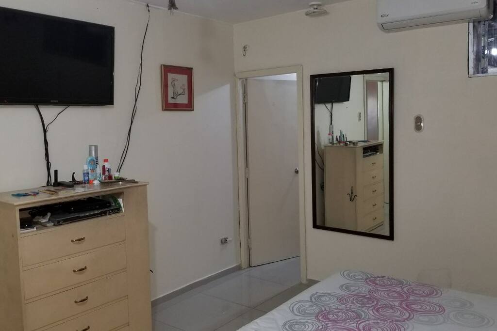 1st bedroom: a King size bed, AC unit, Private master bathroom. Flat screen TV