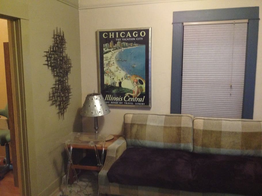 Comfortable living room with love seat sofa.