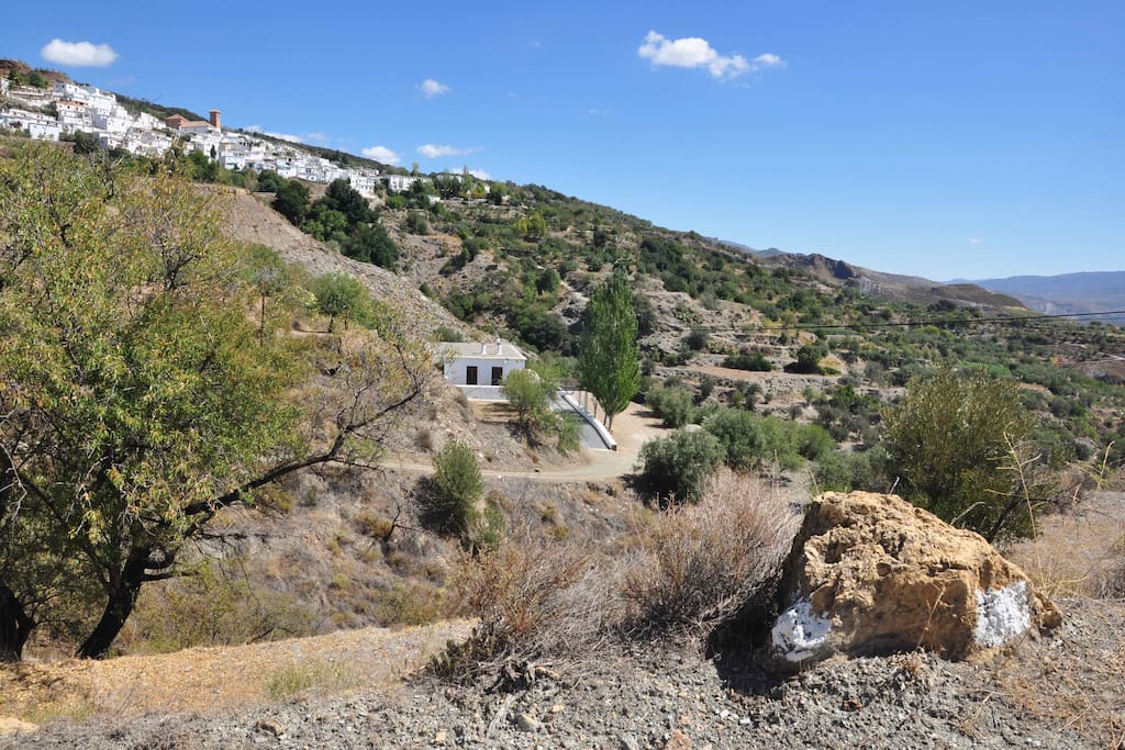 View of Cortijo El Ejido with village of Mairena in the background.