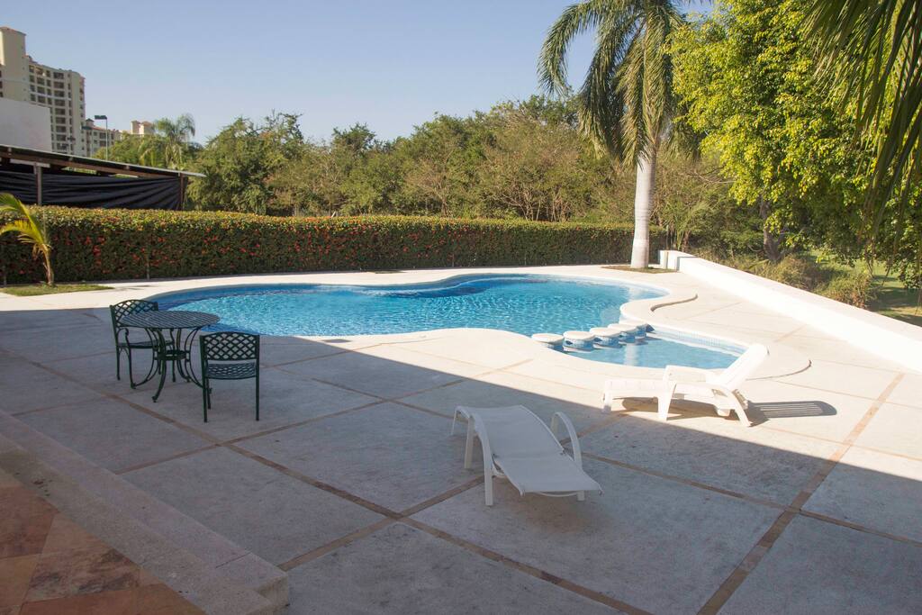 Huge pool area with restrooms