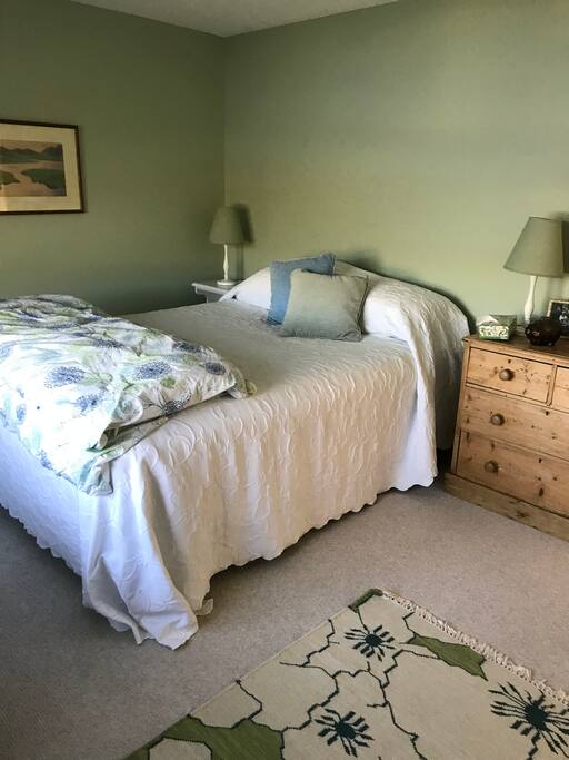 Bedroom 4 with queen bed and view of the lake.