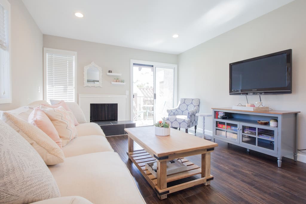 Gorgeous, comfortable living room. Flatscreen TV is equipped with an Amazon Firestick so you can watch all of our favorite movies and television shows on Hulu, Netflix, and Amazon.
