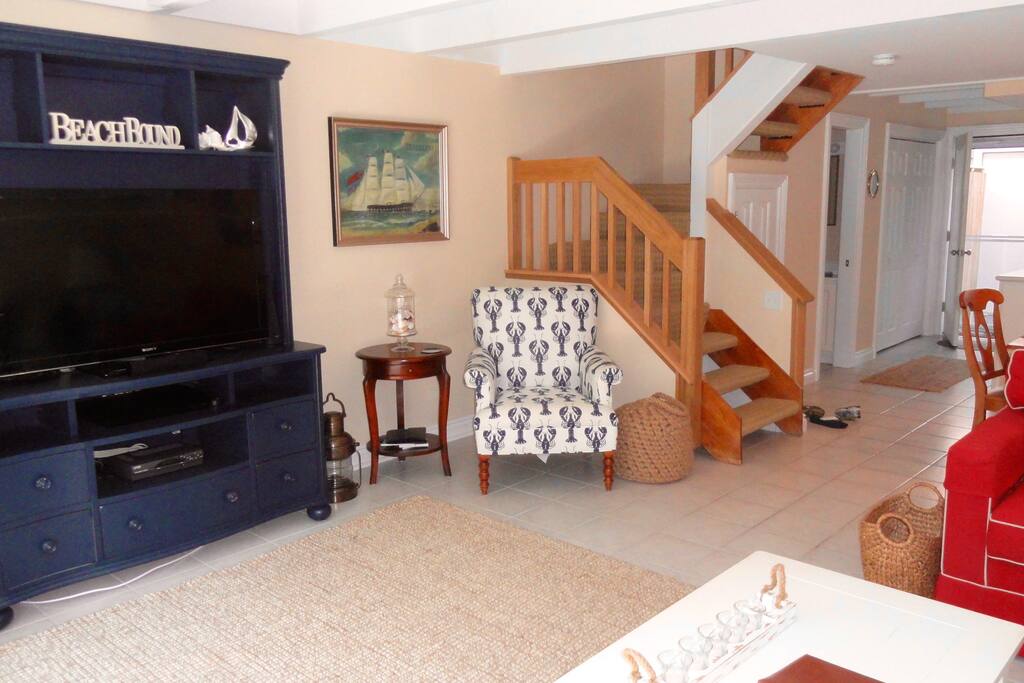 Living room area with stairs
