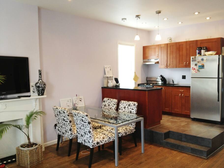 Spacious living room with a dining room area and connected kitchen space.