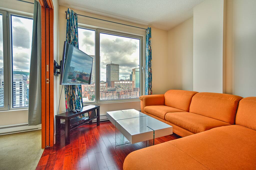 living room (sofa, coffee table, TV)