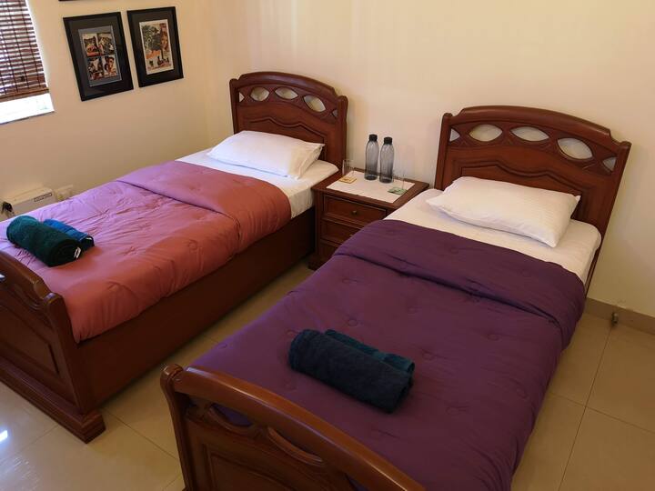 Twin beds in third bedroom.