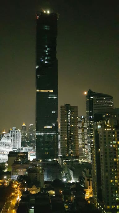 View from the living room overlooking the tallest elegant building of Thailand.